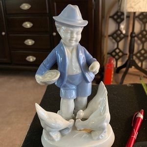 Boy with 3geese porcelain